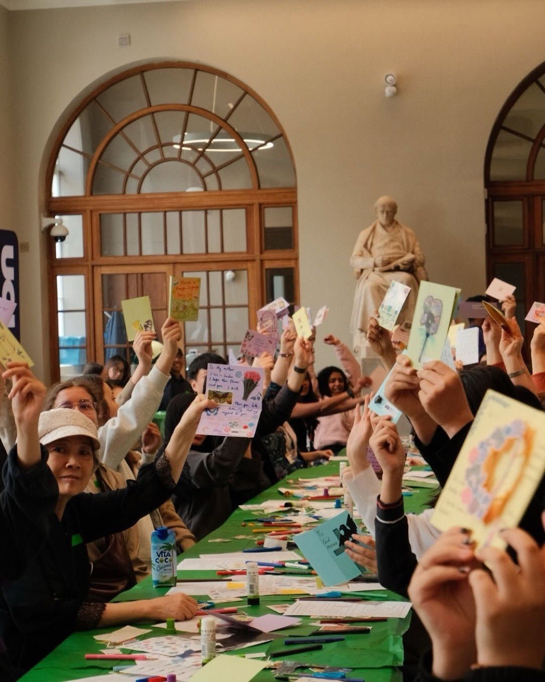 Hundreds of finished cards held up